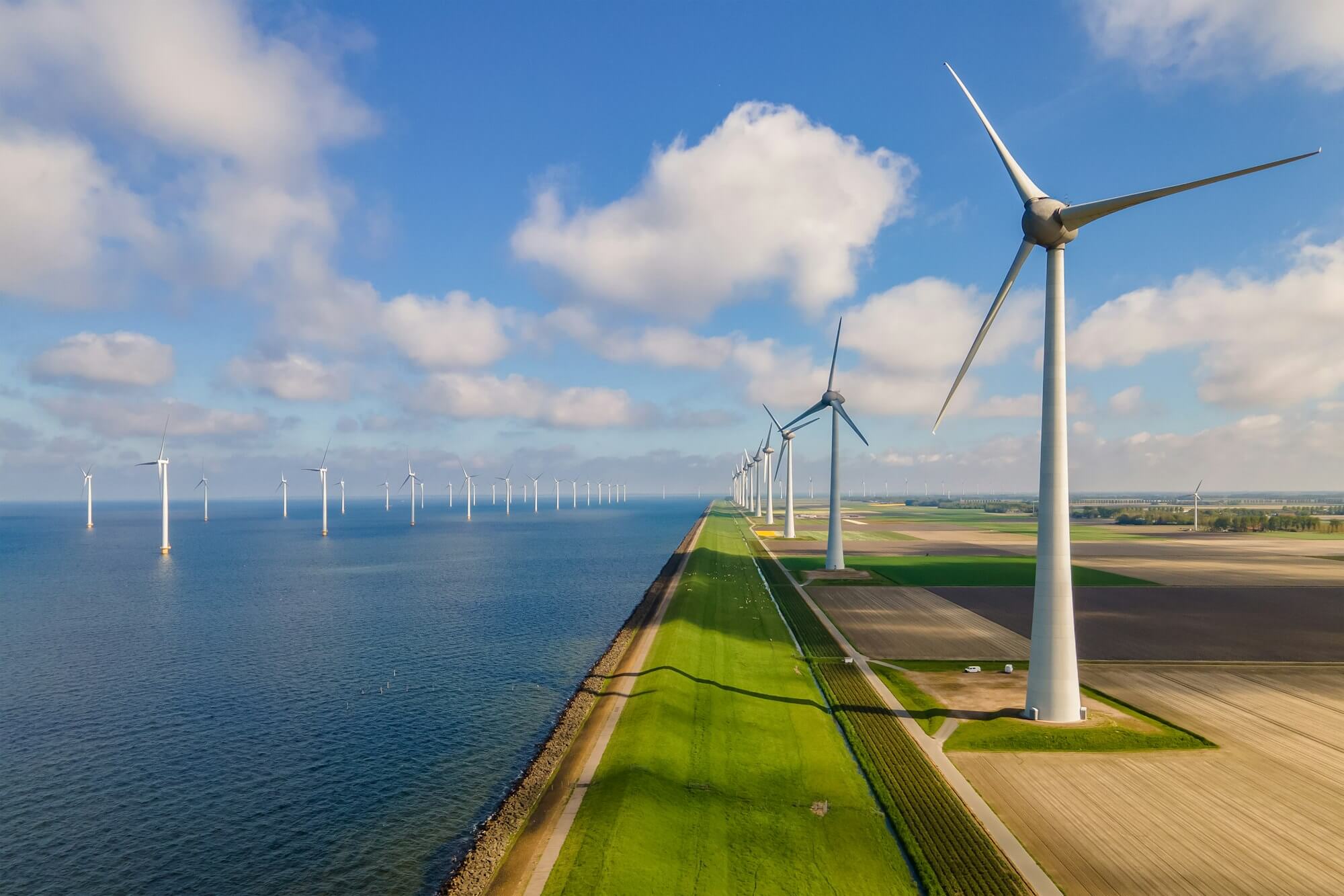 windmill-turbines-at-sea-generate-green-energy-in-the-netherlands.jpg